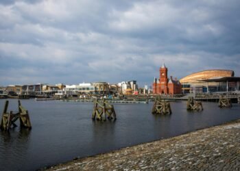 Scenic view of Cardiff Bay, featuring the Pierhead Building and waterfront.